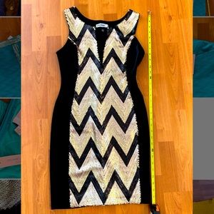 Black and gold sequin dress. Never wore it.